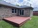 Close-up of wood deck that is just outside of sliding glass doors at 1206 Brownswood Dr, Brownsburg, IN 46112