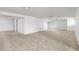 Spacious basement with neutral carpet and painted white walls, offering a blank canvas for customization and future living space at 13019 Pinner Ave, Fishers, IN 46037