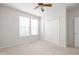 Bright bedroom with double windows, closet, and neutral carpeting at 13019 Pinner Ave, Fishers, IN 46037