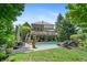 Beautiful backyard featuring a refreshing in-ground pool, spacious deck, and lush landscaping, ideal for outdoor enjoyment at 14027 Waterway Blvd, Fishers, IN 46040
