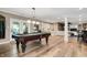Finished basement with a pool table and space for entertaining guests at 14027 Waterway Blvd, Fishers, IN 46040