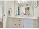 Bathroom featuring a double sink vanity with white cabinets and brushed nickel faucets at 14027 Waterway Blvd, Fishers, IN 46040