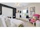 Cozy bedroom featuring neutral carpet, a chalkboard wall, and a bright chair at 14027 Waterway Blvd, Fishers, IN 46040