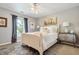 Bright bedroom with a white frame bed, neutral walls, and coordinating artwork at 14027 Waterway Blvd, Fishers, IN 46040