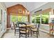 Cozy dining room with brick walls and a unique light fixture at 14027 Waterway Blvd, Fishers, IN 46040