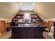 Home office featuring built-in bookcases, a large desk and natural light at 14027 Waterway Blvd, Fishers, IN 46040