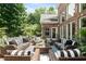 A spacious outdoor seating area featuring wicker furniture, perfect for relaxing and entertaining at 14027 Waterway Blvd, Fishers, IN 46040