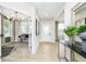 Inviting entryway with an open floor plan, hardwood floors, and a view to a formal office at 16474 Mount Logan Rd, Noblesville, IN 46060