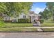 Charming home featuring a well-maintained lawn, inviting front porch, and classic architectural details at 2020 N B St, Elwood, IN 46036
