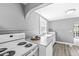 Kitchen featuring ample counter space, appliances, and a well-lit cooking area at 2020 N B St, Elwood, IN 46036