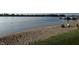 Sandy beach and lake water view on a sunny day at 20876 Waterscape Way, Noblesville, IN 46062