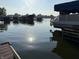 Serene waterfront featuring boat docks and calm, reflective water at 20876 Waterscape Way, Noblesville, IN 46062