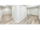 Basement area with several closets and wood-look flooring at 2136 Ringgold Ave, Indianapolis, IN 46203