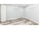 A spacious basement with modern flooring and good lighting, perfect for a cozy living space at 2136 Ringgold Ave, Indianapolis, IN 46203