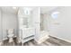 Bright bathroom with modern vanity, toilet and shower/tub combo at 2136 Ringgold Ave, Indianapolis, IN 46203