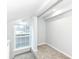 Neutral bedroom with lots of light from large window and soft carpet flooring at 2136 Ringgold Ave, Indianapolis, IN 46203