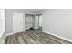 The bedroom boasts new wood floors, a storage closet, and built-in shelves for organization at 2136 Ringgold Ave, Indianapolis, IN 46203
