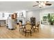Dining area with hardwood floors, fireplace, and open to the kitchen, perfect for entertaining at 2227 Hidden Orchard Ct, Indianapolis, IN 46228