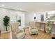 Open-concept living room with views of the kitchen and a front door at 2227 Hidden Orchard Ct, Indianapolis, IN 46228