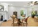 Cozy living room with a glass table and a fireplace at 2227 Hidden Orchard Ct, Indianapolis, IN 46228