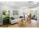 Bright living room featuring a comfortable sofa and a view to another room at 2227 Hidden Orchard Ct, Indianapolis, IN 46228