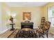 Music room featuring a piano, side table, and a colorful rug at 2227 Hidden Orchard Ct, Indianapolis, IN 46228