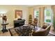 Charming piano room with a window and a rug at 2227 Hidden Orchard Ct, Indianapolis, IN 46228