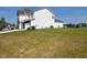 New construction home with neutral siding, attached two-car garage, and green lawn at 2232 Warbler St, Danville, IN 46122