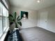 Bright office space with large window, stylish decor, and neutral walls and carpet at 2232 Warbler St, Danville, IN 46122