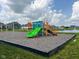 The community offers a vibrant green playground with a modern slide and climbing equipment at 2232 Warbler St, Danville, IN 46122
