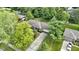 A charming single-story home with mature trees in a well-manicured yard, with an attached two-car garage at 2315 Elm Swamp Rd, Lebanon, IN 46052