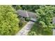 A charming single-story home with mature trees in a well-manicured yard, with an attached two-car garage at 2315 Elm Swamp Rd, Lebanon, IN 46052