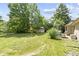 Spacious backyard with a large, well-maintained lawn and a peaceful ambiance at 2315 Elm Swamp Rd, Lebanon, IN 46052