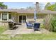 Relaxing backyard patio with outdoor seating and a grill, perfect for entertaining guests at 2315 Elm Swamp Rd, Lebanon, IN 46052