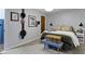 A quaint bedroom with a cozy queen-sized bed, unique decor, and carpeted floors at 2315 Elm Swamp Rd, Lebanon, IN 46052