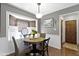 Bright dining area features a bay window, cozy round table, and stylish accents with an inviting ambiance at 2315 Elm Swamp Rd, Lebanon, IN 46052