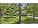 This home boasts a lush green lawn with mature trees providing plenty of shade and curb appeal at 2315 Elm Swamp Rd, Lebanon, IN 46052
