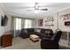 Cozy living room with comfortable seating and modern ceiling fan at 2315 Elm Swamp Rd, Lebanon, IN 46052
