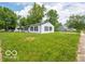 Inviting single-Gathering home with lush green yard and a serene neighborhood setting at 3101 Gerrard Ave, Indianapolis, IN 46224