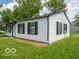 This angle showcases the home's clean design and well-maintained landscaping at 3101 Gerrard Ave, Indianapolis, IN 46224