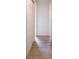 Hallway with light colored laminate flooring at 3101 Gerrard Ave, Indianapolis, IN 46224