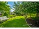 This lush, expansive backyard has lots of space and features manicured landscaping at 317 Stoner Dr, Anderson, IN 46013