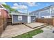Backyard showcasing a wood deck, small bench and garage at 329 Parkway Ave, Indianapolis, IN 46225