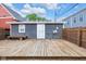 The backyard features a nice wood deck and single car garage at 329 Parkway Ave, Indianapolis, IN 46225