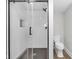 Contemporary bathroom featuring tile walk-in shower and low-flow toilet at 329 Parkway Ave, Indianapolis, IN 46225