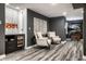 Basement showcasing sleek built-in wine storage, comfortable seating area, and unique decor on gray walls at 350 N Meridian St # 606/607, Indianapolis, IN 46204