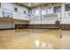 Large indoor gymnasium set up for badminton with bright lighting and painted lines at 350 N Meridian St # 606/607, Indianapolis, IN 46204