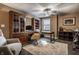 Home office boasting custom built-ins, hardwood floors, and a large desk with office chair at 350 N Meridian St # 606/607, Indianapolis, IN 46204