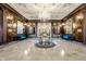 Grand lobby featuring marble floors, decorative columns, a chandelier, and stylish seating at 350 N Meridian St # 606/607, Indianapolis, IN 46204