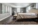 Serene main bedroom with neutral colors, soft lighting, and comfortable seating by the window at 350 N Meridian St # 606/607, Indianapolis, IN 46204